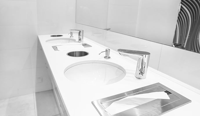 luxury touchless faucets in washroom